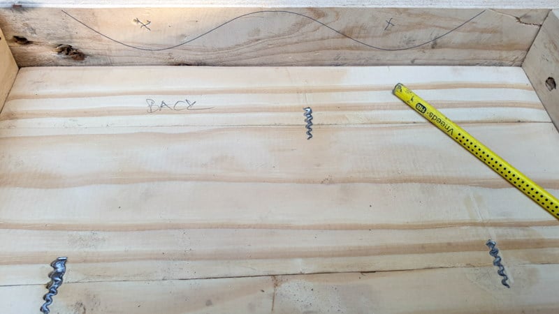 Add a curved detail to the bottom