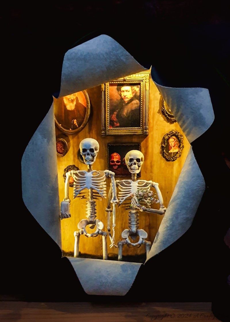 Get your spook on and add a touch of macabre whimsy to your d&eacute;cor with this DIY Halloween RIPped canvas tutorial. It even lights up. We&rsquo;ll show you how to turn a deep canvas into an eerie masterpiece using paint, paste and two loving skeletons. Oh, be warned; we will be cutting, slicing, and mangling things up a little to make this haunting diorama.