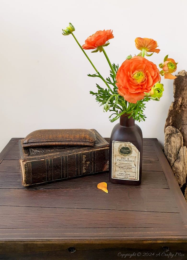 Repurpose a crate to make a rustic side table and give your space a unique, creative makeover. This DIY project is a perfect way to add a touch of vintage charm to your home and create extra storage at the same time. The free tutorial will guide you through the whole process. As an added bonus, we&rsquo;ll show you how to make faux metal hinges using cardboard and create custom door pulls.