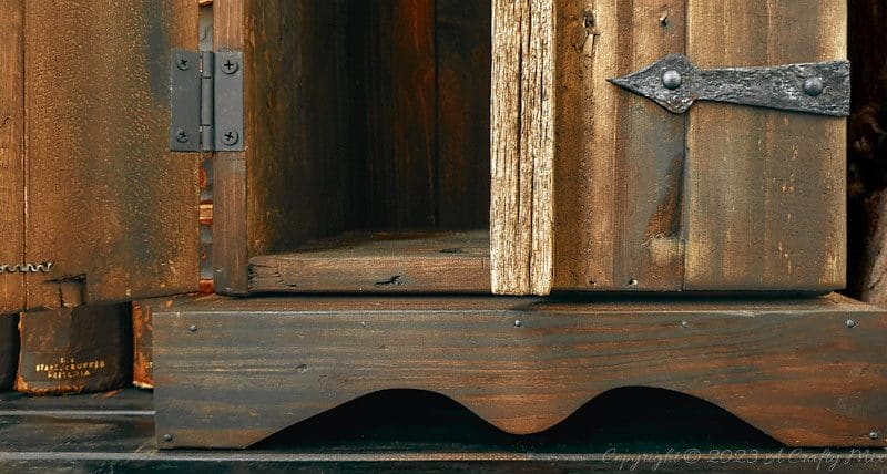 Repurpose a crate to make a rustic side table and give your space a unique, creative makeover. This DIY project is a perfect way to add a touch of vintage charm to your home and create extra storage at the same time. The free tutorial will guide you through the whole process. As an added bonus, we&rsquo;ll show you how to make faux metal hinges using cardboard and create custom door pulls.