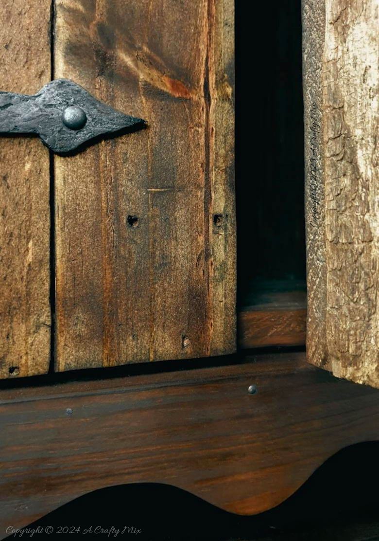 Repurpose a crate to make a rustic side table and give your space a unique, creative makeover. This DIY project is a perfect way to add a touch of vintage charm to your home and create extra storage at the same time. The free tutorial will guide you through the whole process. As an added bonus, we&rsquo;ll show you how to make faux metal hinges using cardboard and create custom door pulls.