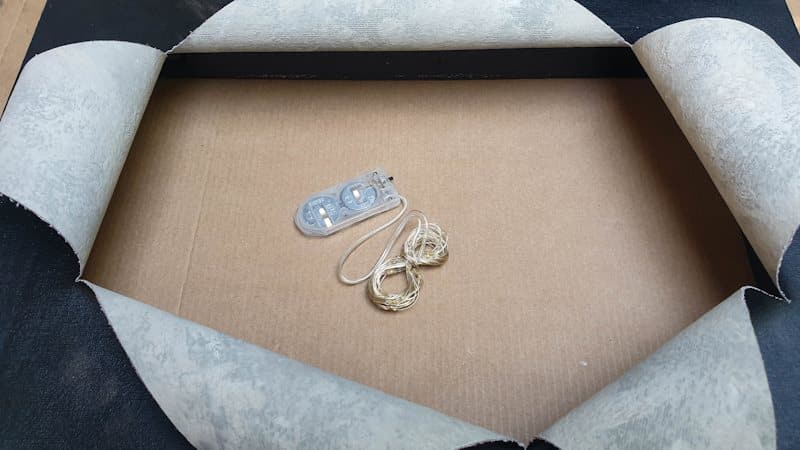 Battery powered fairy lights ready to be added to the RIPped canvas