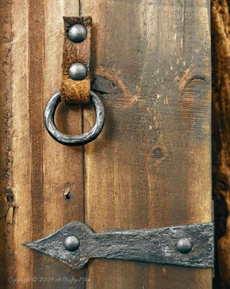 Repurpose a crate to make a rustic side table and give your space a unique, creative makeover. This DIY project is a perfect way to add a touch of vintage charm to your home and create extra storage at the same time. The free tutorial will guide you through the whole process. As an added bonus, we&rsquo;ll show you how to make faux metal hinges using cardboard and create custom door pulls.