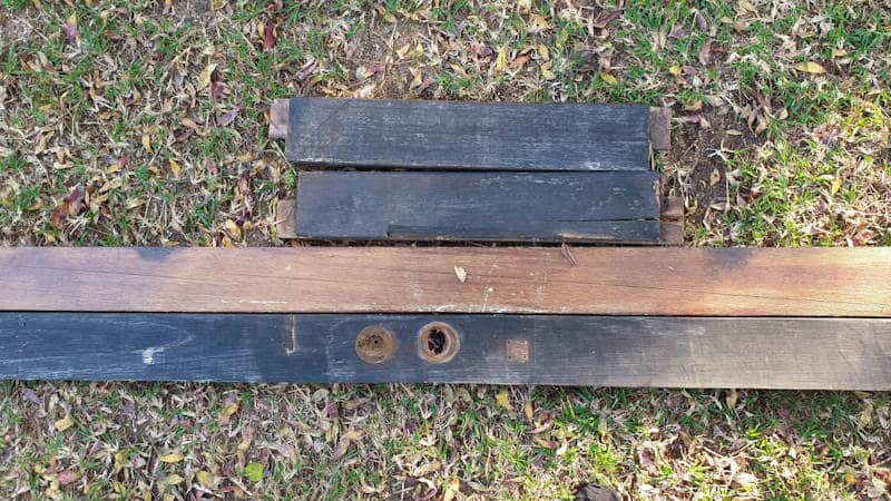 Dismantle an old door to salvage the wood for the cabinet