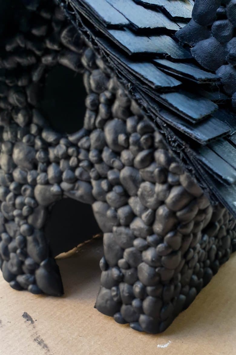 Paint the stone cladding black