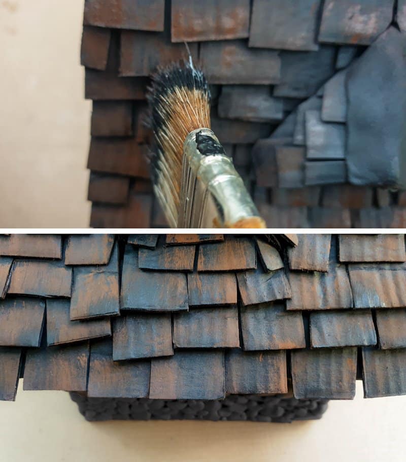 Dry brush a brown color onto the roof shingles