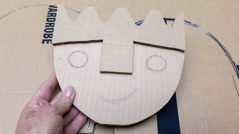 Add facial features using cardboard