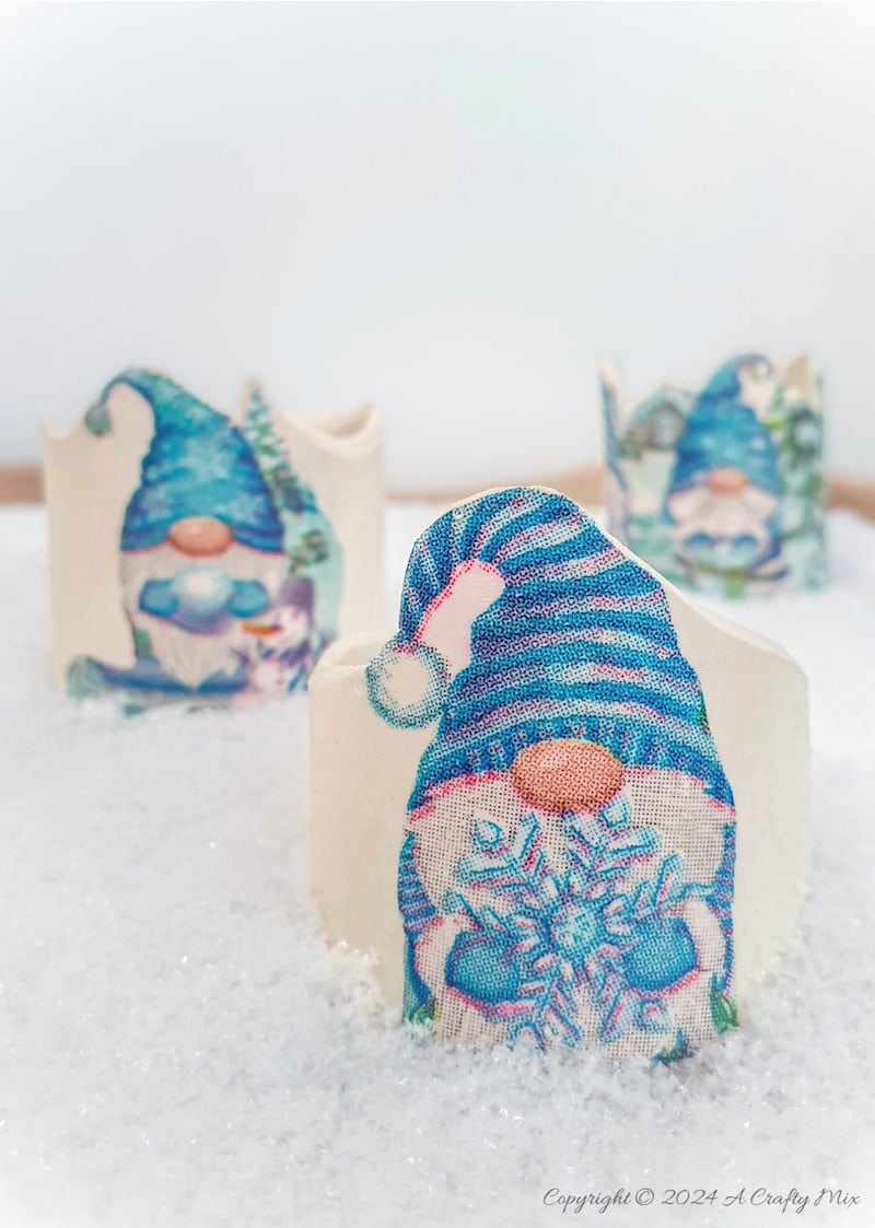 If pint-sized, bearded creatures with pointy hats put a smile on your face, then you&rsquo;re going to love this craft project. We&rsquo;ll show you how to make these adorable gnome napkin rings using clay. Not only are they unique, but they add a touch of whimsy to any setting! Perfect for a festive or winter-themed party!