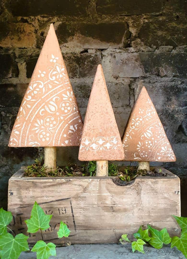 Forget about fancy ovens and expensive paint, this easy tutorial will show you how to use inexpensive craft paint to give almost anything a terracotta makeover.