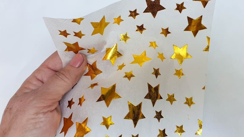 Cut out the printed portion of the napkin
