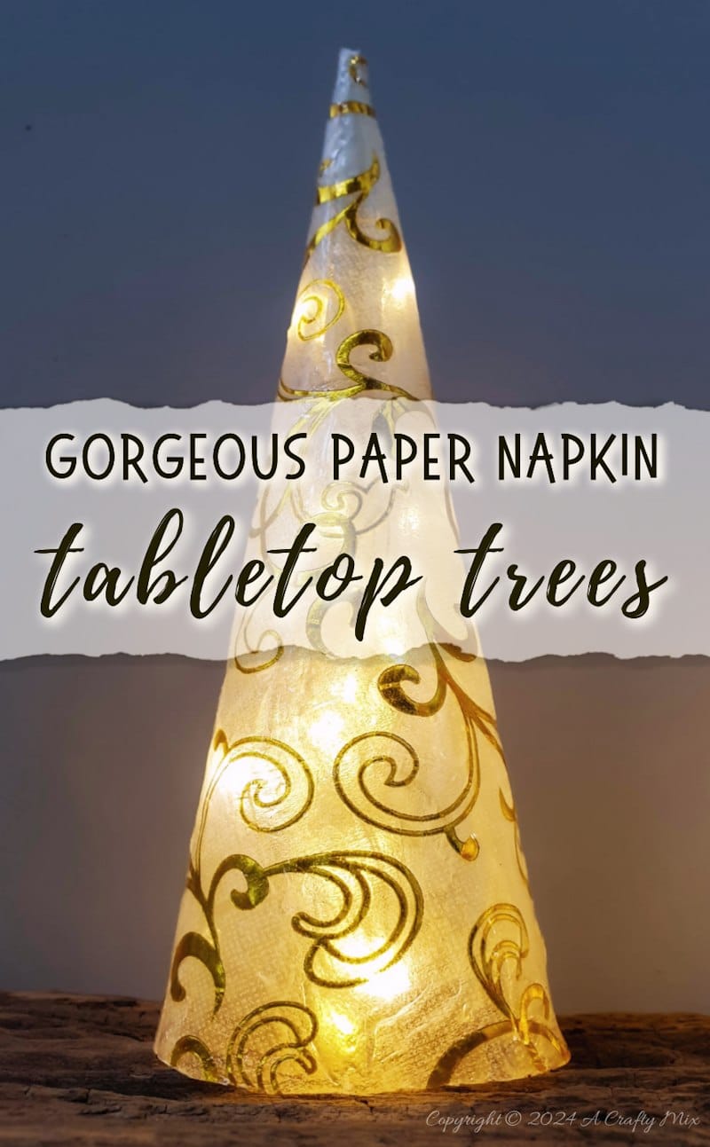 Get ready to add a little sophistication to your decor with these elegant and easy to make tabletop trees that will brighten up any room in your home. Made from paper napkins and filled with fairy lights, these Christmas decorations are perfect for small spaces and look beautiful on a table, mantle or bookshelf. Go glam with hints of gold or use napkins that match your table d&eacute;cor.
