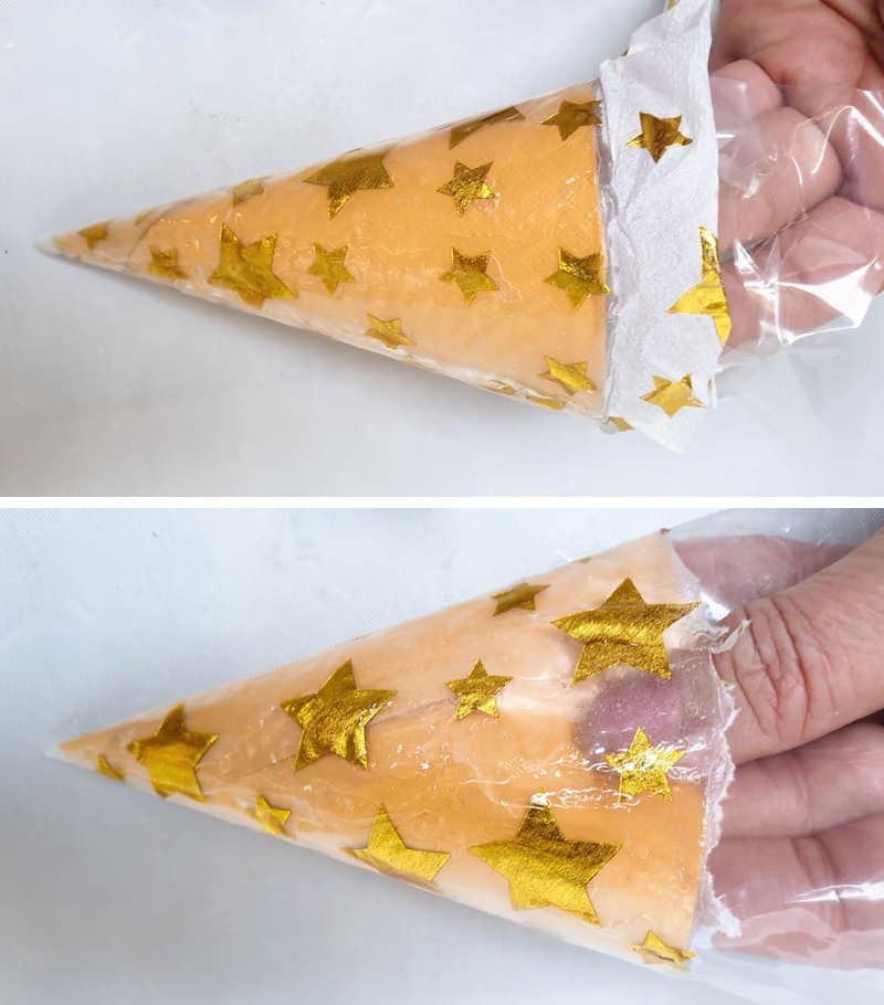 Once the resin cures, remove the inner paper cone