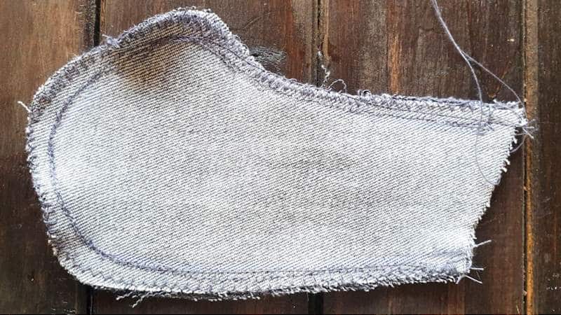 Zig-zag around the edges to stop the fabric from fraying