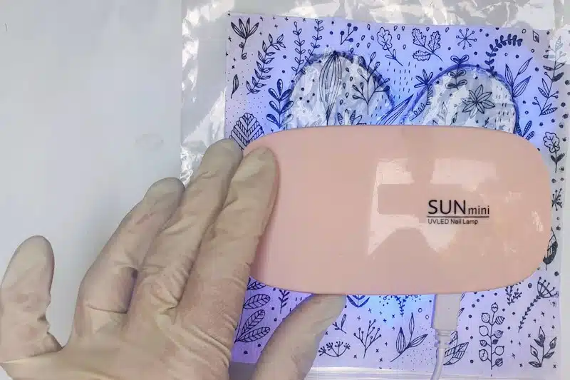Cure the resin under a UV light for the recommended time