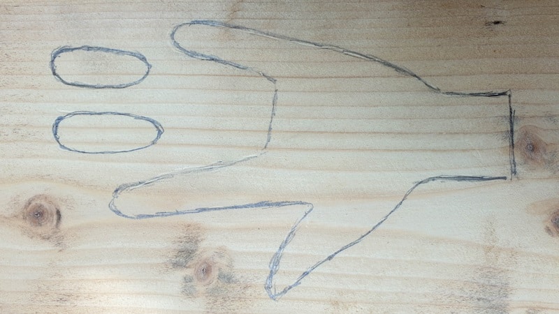 ASL "I love you" hand sign on a piece of wood