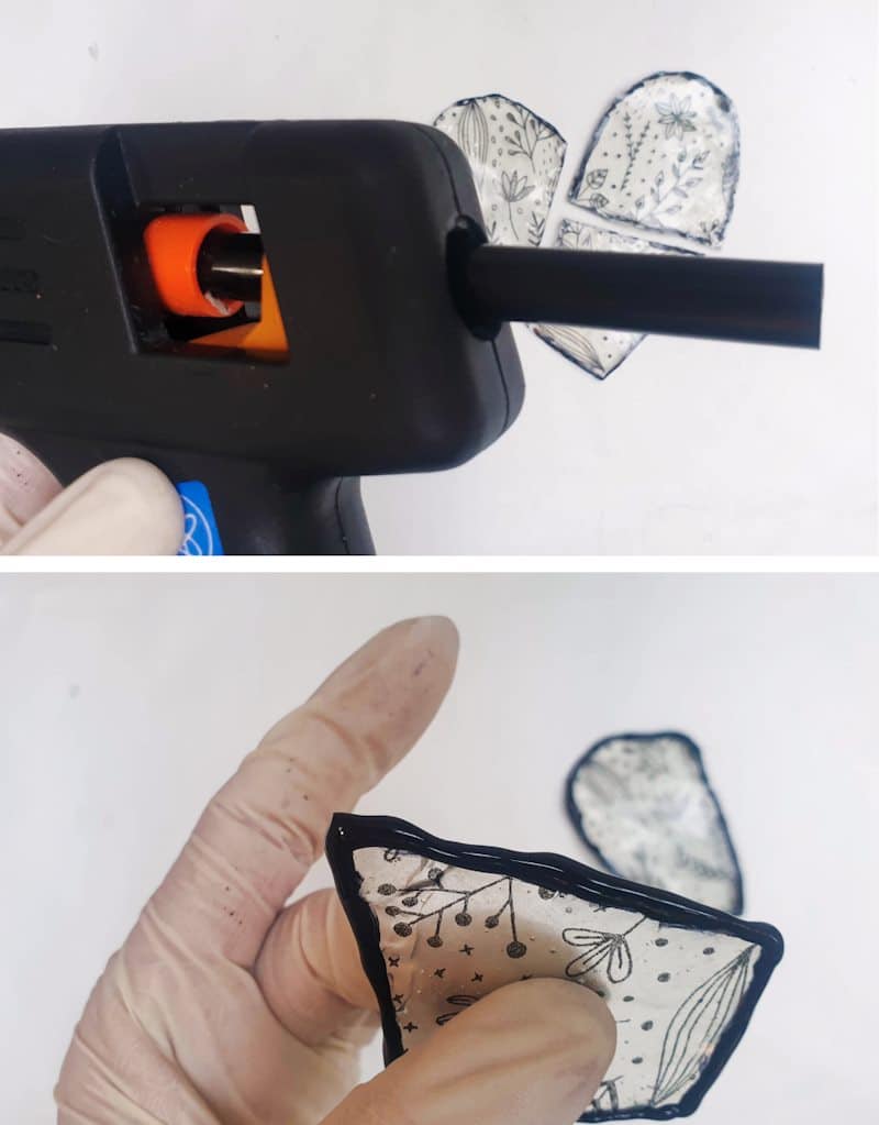 Hot glue around the edges to create the leaded glass effect