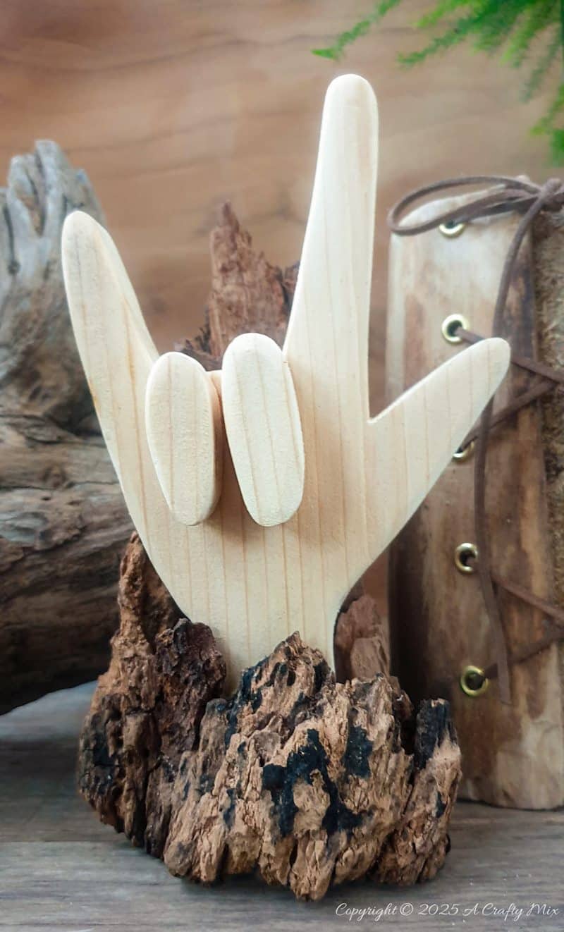 Are you looking for a thoughtful gift to express your love? We'll show you how to make an ASL 'I Love You' hand sign using scrap wood. It&rsquo;s a gift from the heart. The tutorial includes a free cutting template.