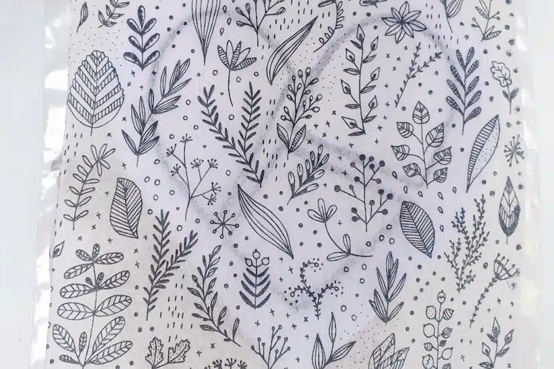 Place the napkin over the heart drawing