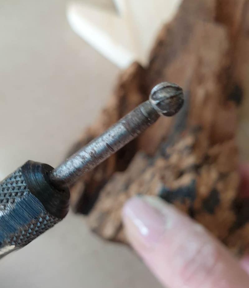 Use a small ball wood carving burr to hollow out the stump
