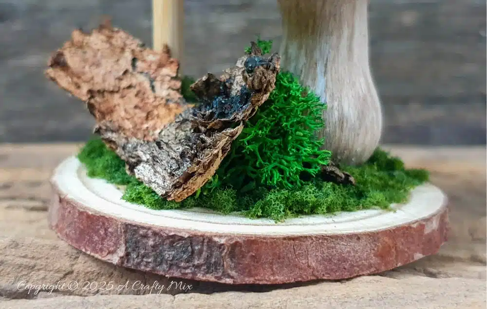 Have we got a fun, festive craft idea to bring a touch of Irish charm to our decor! I’ll show you how to make these place cardholders with tiny leprechauns, a polystyrene ball mushroom, and a signpost. Not only will these adorable little accents add a pop of color to your table, but they're super simple to make too.