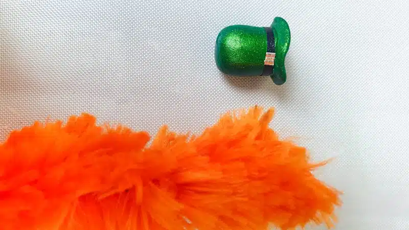 We'll use a fluffy pipe cleaner to make the leprechaun's beard