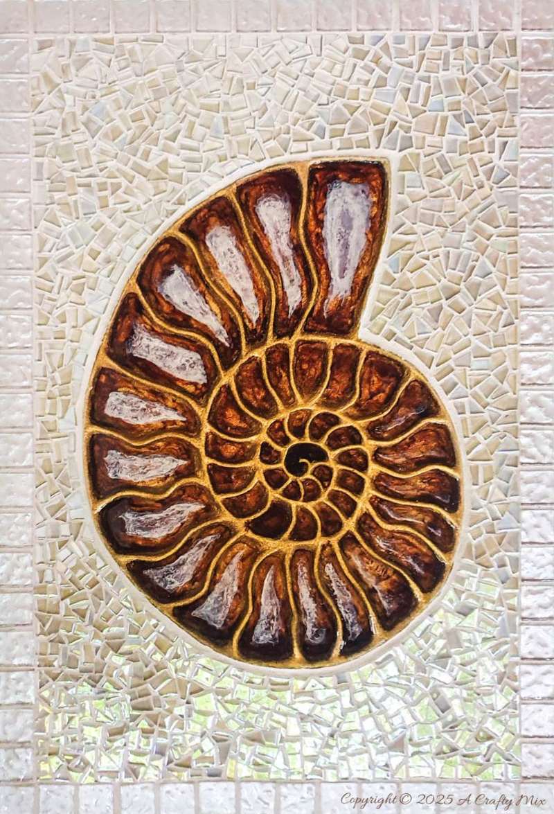 Looking for a unique way to breathe new life into an old piece of furniture? We&rsquo;ll show you how we gave a water-damaged tabletop a gorgeous &ldquo;mosaic and ammonite inlay&rdquo; makeover. This comprehensive guide provides detailed, easy-to-follow steps (with loads of photos) that will help you create your own masterpiece from start to finish. And you don&rsquo;t need any fancy materials to pull this one off either.