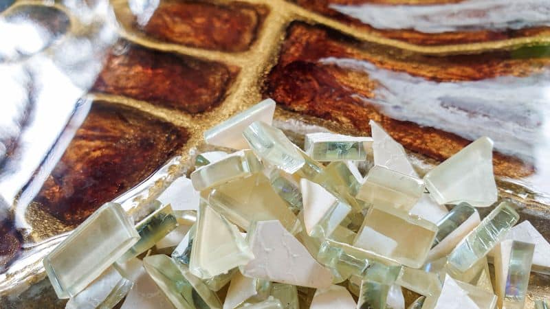 Small square mosaic tiles cut into random shapes