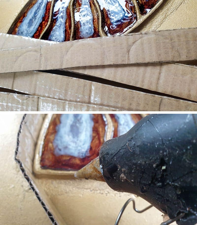Use cardboard to create a border around the ammonite inlay
