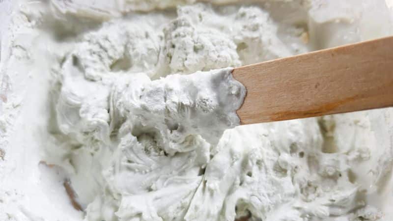 Mix up a batch of tile adhesive.