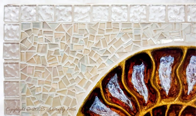 Looking for a unique way to breathe new life into an old piece of furniture? We&rsquo;ll show you how we gave a water-damaged tabletop a gorgeous &ldquo;mosaic and ammonite inlay&rdquo; makeover. This comprehensive guide provides detailed, easy-to-follow steps (with loads of photos) that will help you create your own masterpiece from start to finish. And you don&rsquo;t need any fancy materials to pull this one off either.