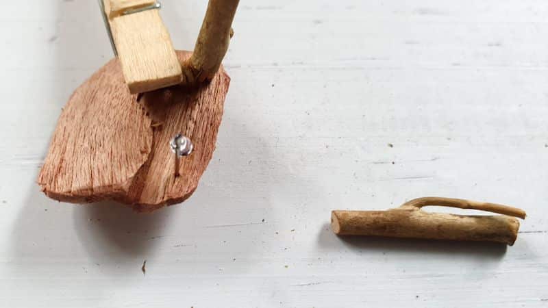 Glue the legs on and use a peg as a clamp