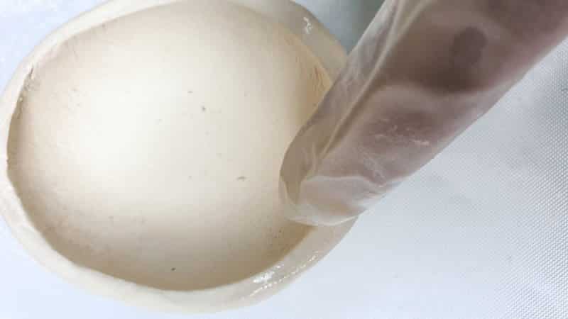 Neaten the clay edges by dipping your finger in some water and smoothing the edge out