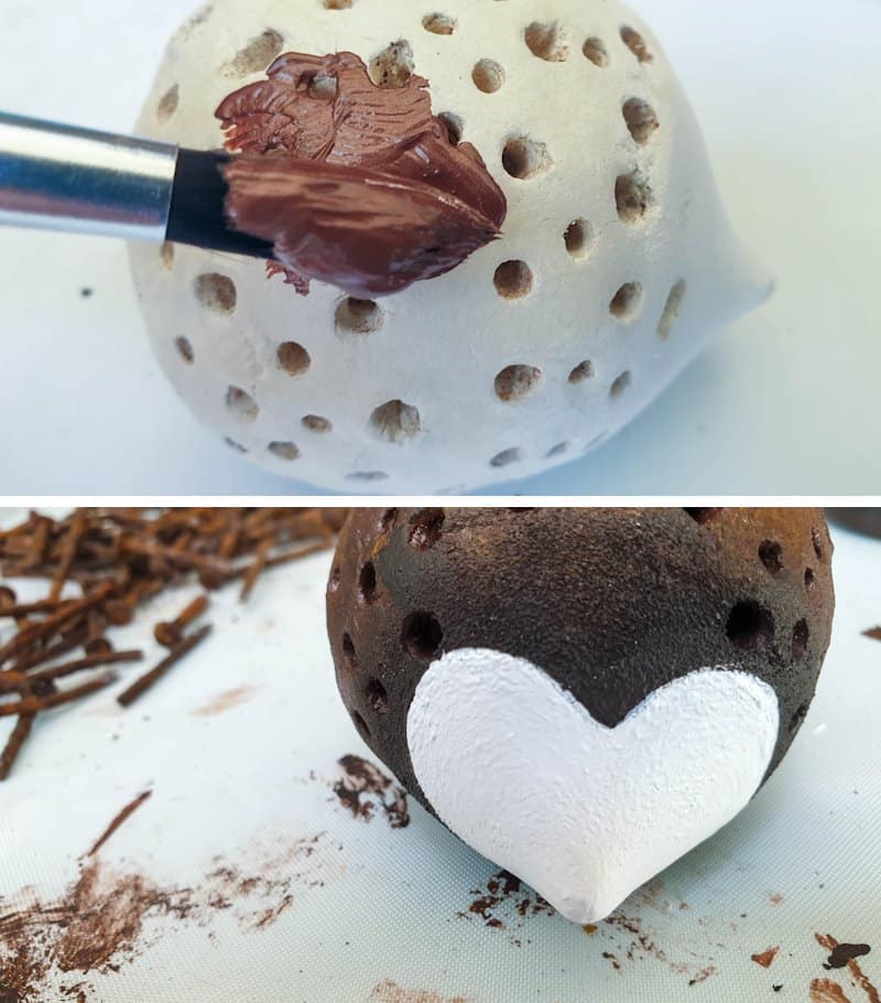 Paint the clay hedgehog body brown and face white