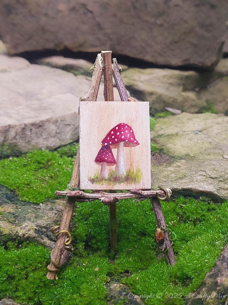 Make your own fairy easel and mini paintbrushes with this step-by-step tutorial. These charming little crafts are quick, easy and perfect for fairy gardens, dollhouse displays, or showcasing miniature art.