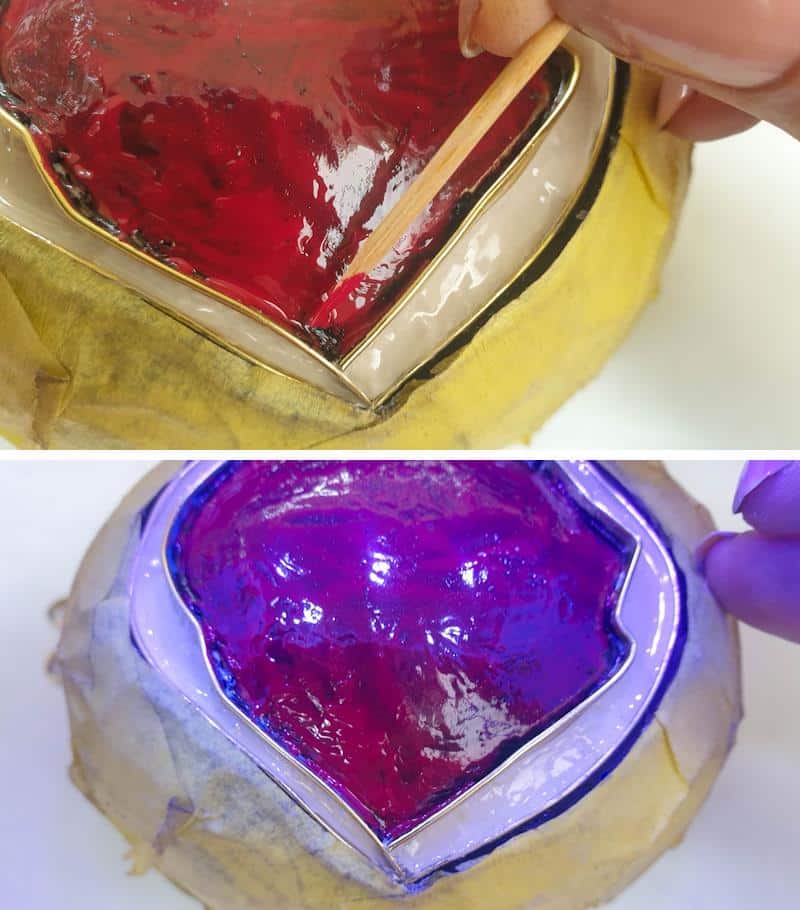 Apply a thin layer of red gel nail polish and cure