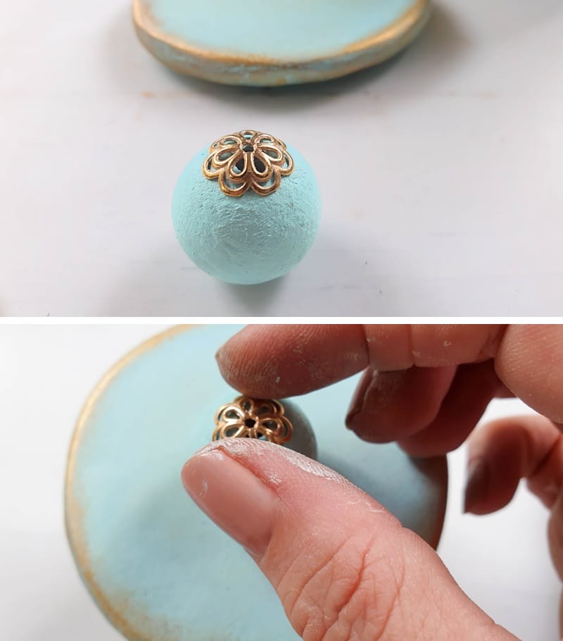 Use a large wooden bead and add it to the lid