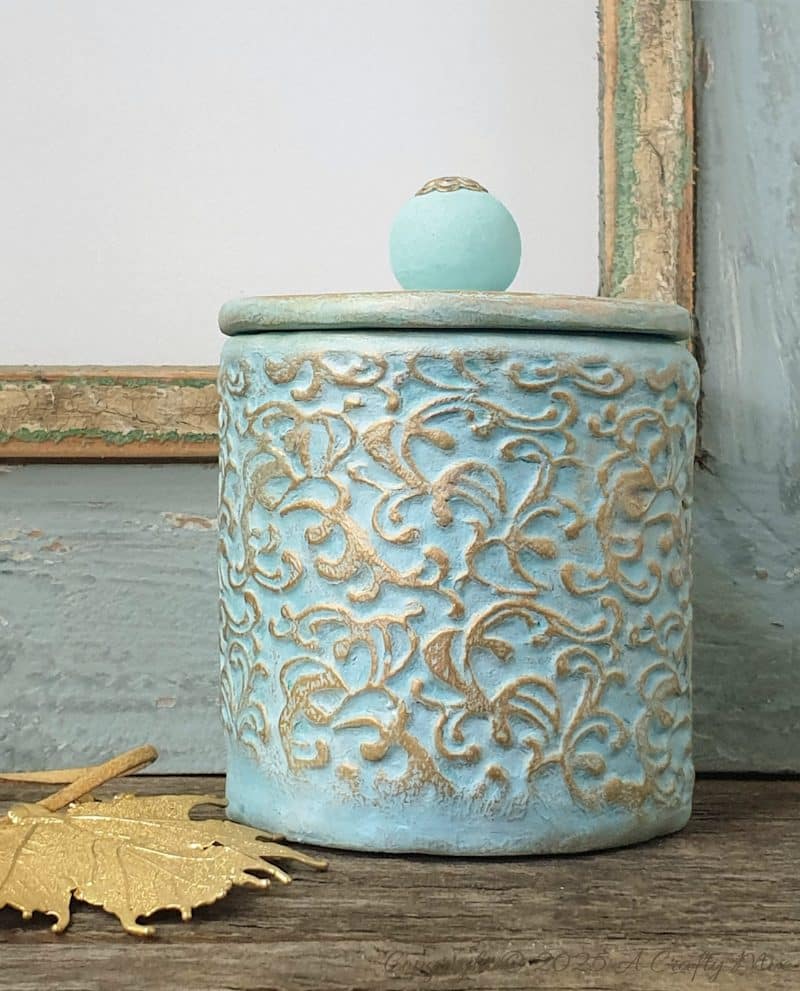 From snacks to décor. Upcycle a Pringles can into a gorgeous vintage embossed container with a boutique pottery finish. This DIY project is easier than it looks.