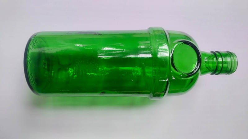 Use a clean empty glass or plastic bottle for this upcycled craft idea