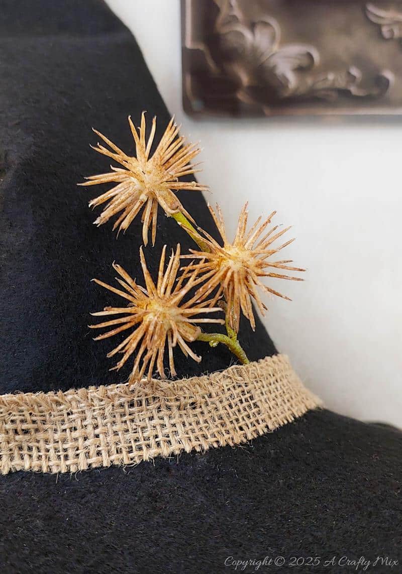 Turn a recycled plastic bottle into a cute gothic witch with mop hair and a tulle dress. This fun DIY tutorial is perfect for Halloween decor and easy enough for crafters of any level. Add a touch of handmade magic to your spooky season with this adorable upcycled project.