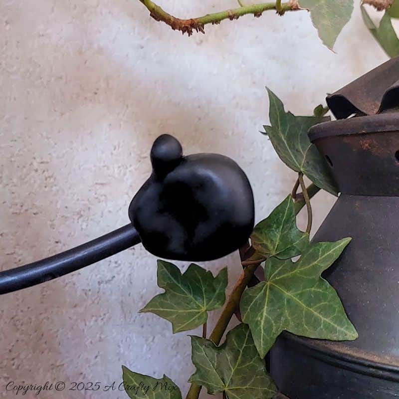 Turn a recycled plastic bottle into a cute gothic witch with mop hair and a tulle dress. This fun DIY tutorial is perfect for Halloween decor and easy enough for crafters of any level. Add a touch of handmade magic to your spooky season with this adorable upcycled project.