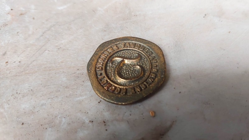 Age the stamp with copper or bronze rub and buff