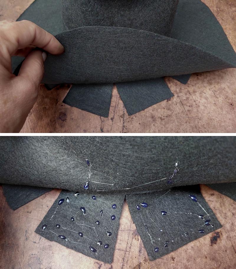 Glue the brim of the witch's hat down over the slits