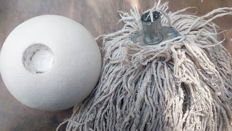 The used mop and polystyrene (styrofoam) ball I used to make the witch's head