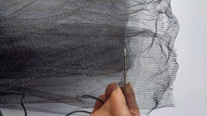 Use a running, or in-and-out, stitch and sew along the top of the tulle