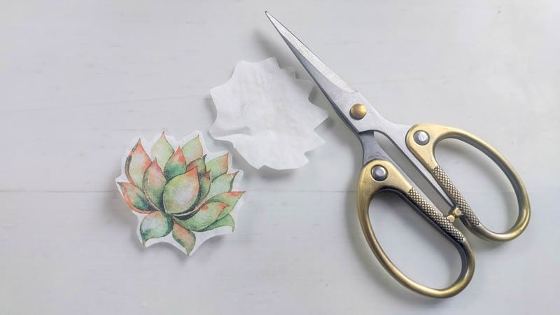 Remove the plain back layer on the paper napkin/serviette