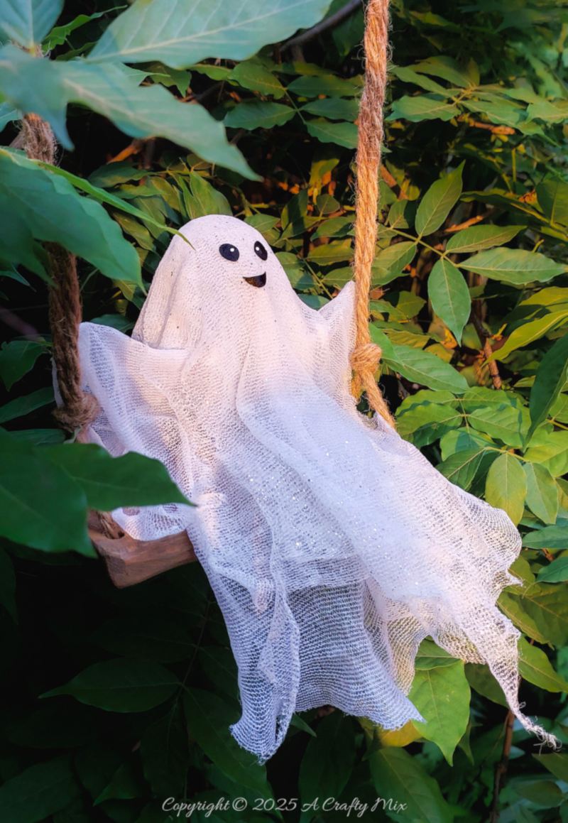 Add a pinch of playful fright to your Halloween with easy to make ghost on a swing—hang it indoors or out so he can welcome trick-or-treaters with his cheeky grin. Perfect for adding a magical, kid-friendly twist to any festive space.