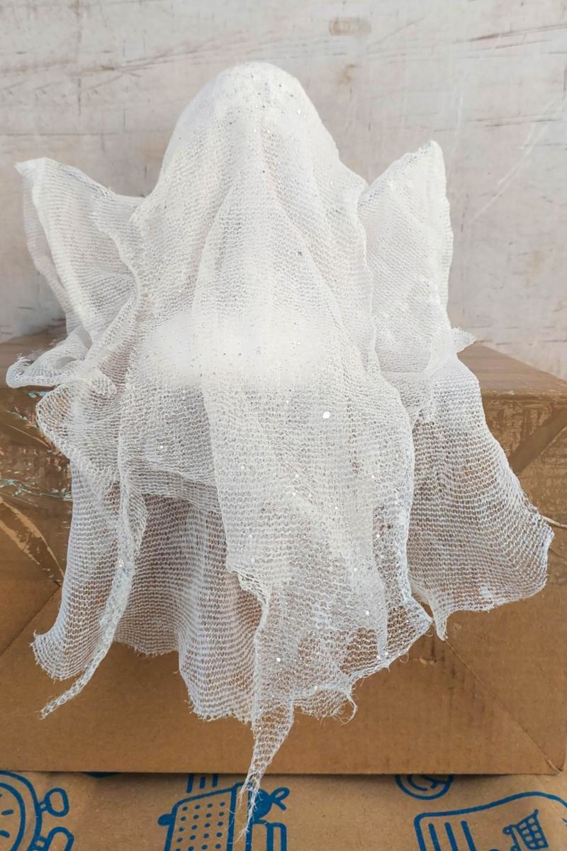 Leave the ghost to dry in a seated position on a box