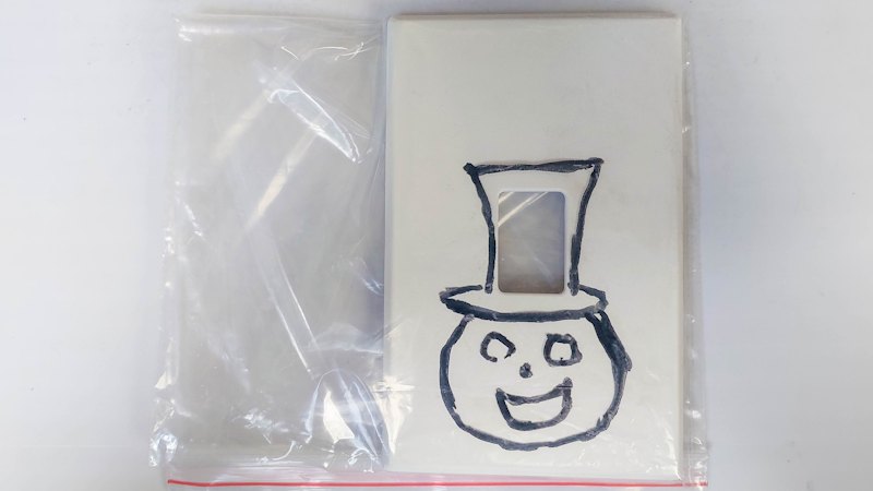 Place the switch cover inside a Ziploc bag to protect it while we make the pumpkin