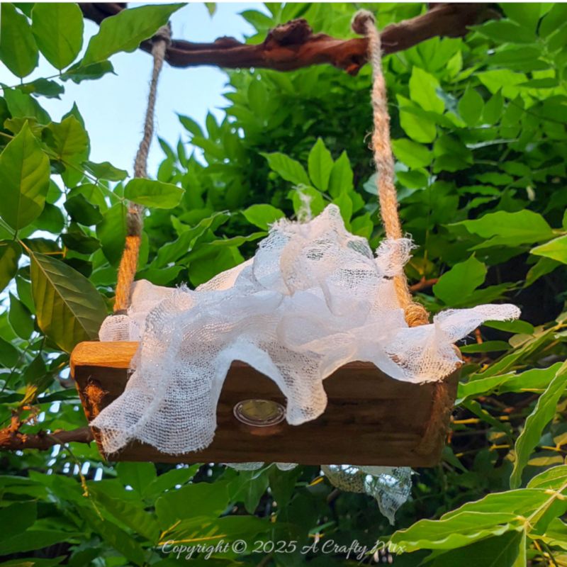 Add a pinch of playful fright to your Halloween with easy to make ghost on a swing&mdash;hang it indoors or out so he can welcome trick-or-treaters with his cheeky grin. Perfect for adding a magical, kid-friendly twist to any festive space.