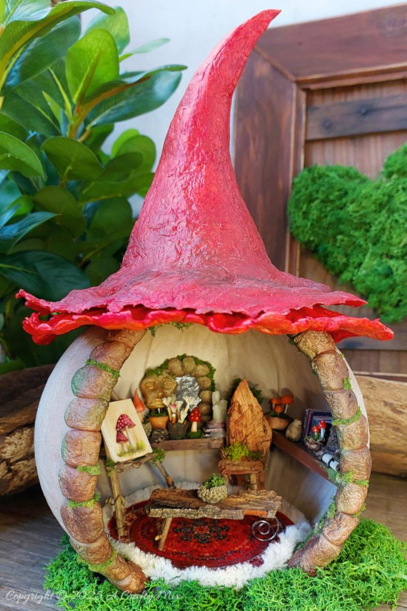 Transform an ordinary plastic pumpkin bucket into a magical fairy artist&rsquo;s studio, complete with a mushroom-capped roof, miniature easel, and enchanting woodland details. Perfect for upcycling fans and fairy garden lovers looking to add a whimsical touch to their creative craft projects.